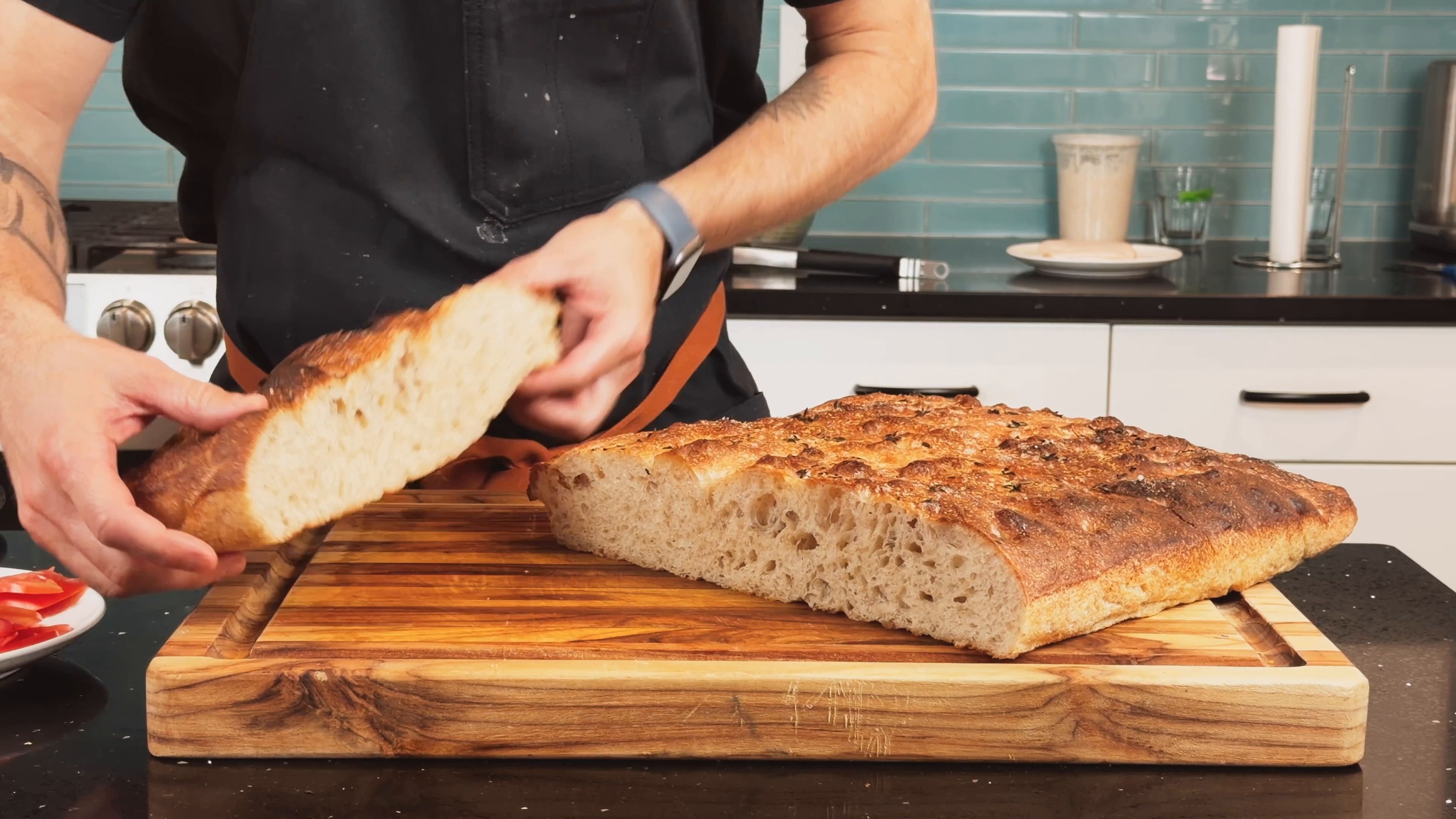Sliced golden focaccia showing its airy interior